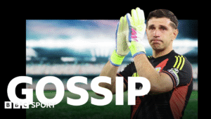 Sarina Wiegman looks forward with a fixed expression