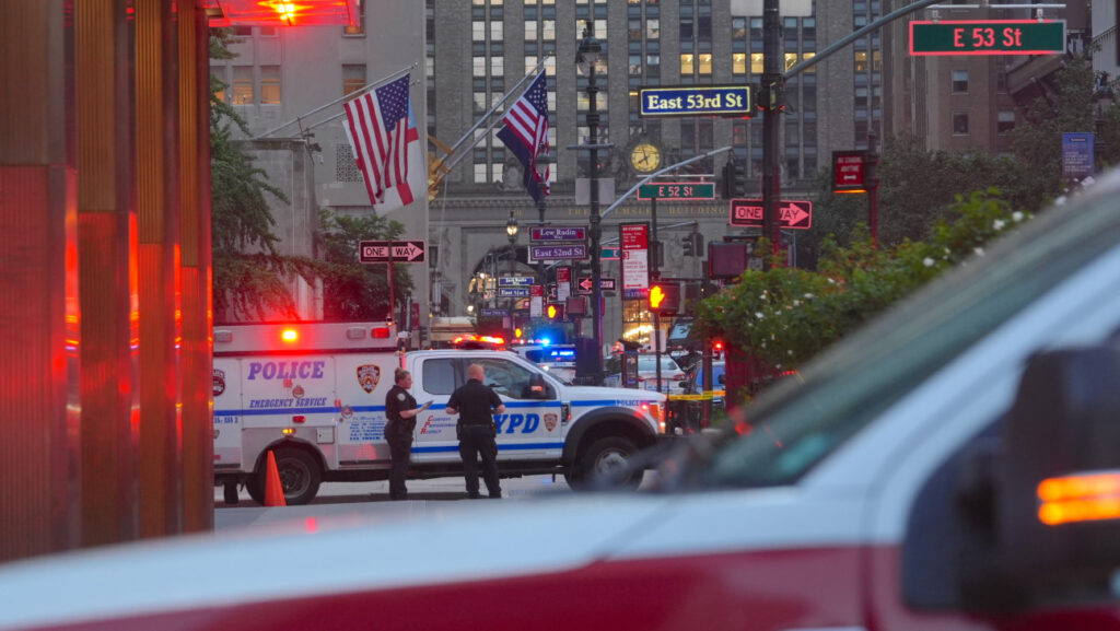The scene in Midtown Manhattan Monday night after the deadly shooting at the NFL's New York City offices.