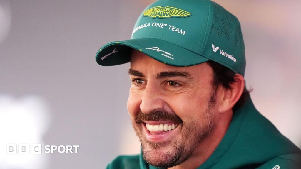 A smiling Fernando Alonso being interviewed after Dutch Grand Prix second practice