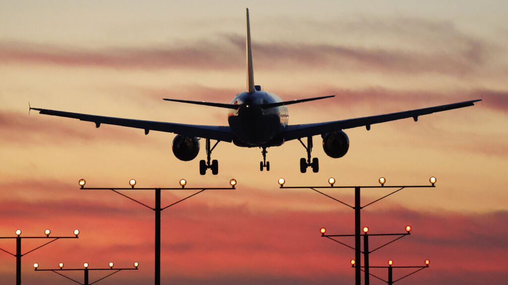 A Delta Airlines plane lands at Los Angeles International Airport.
