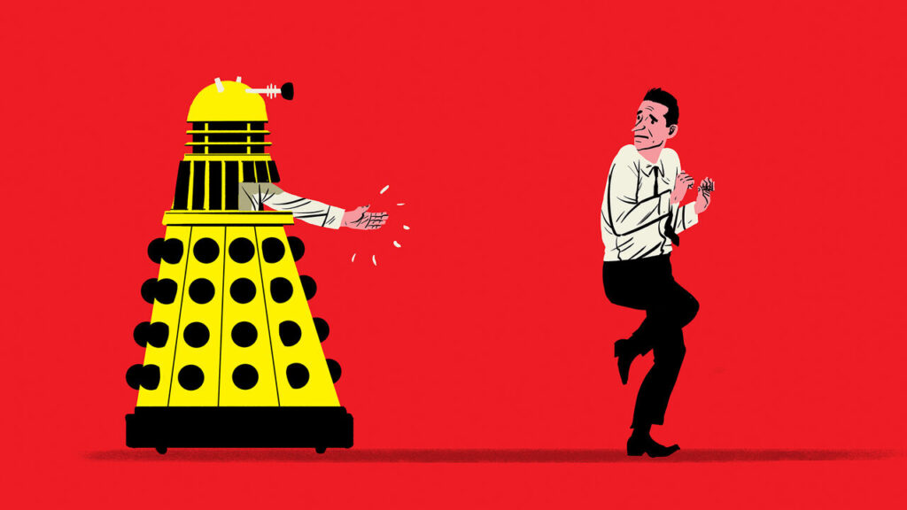 A man in a Dalek costume reaches out for a handshake with his colleague, who looks coy and is wincing.