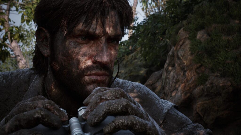 solid snake holding binoculars while covered in mud