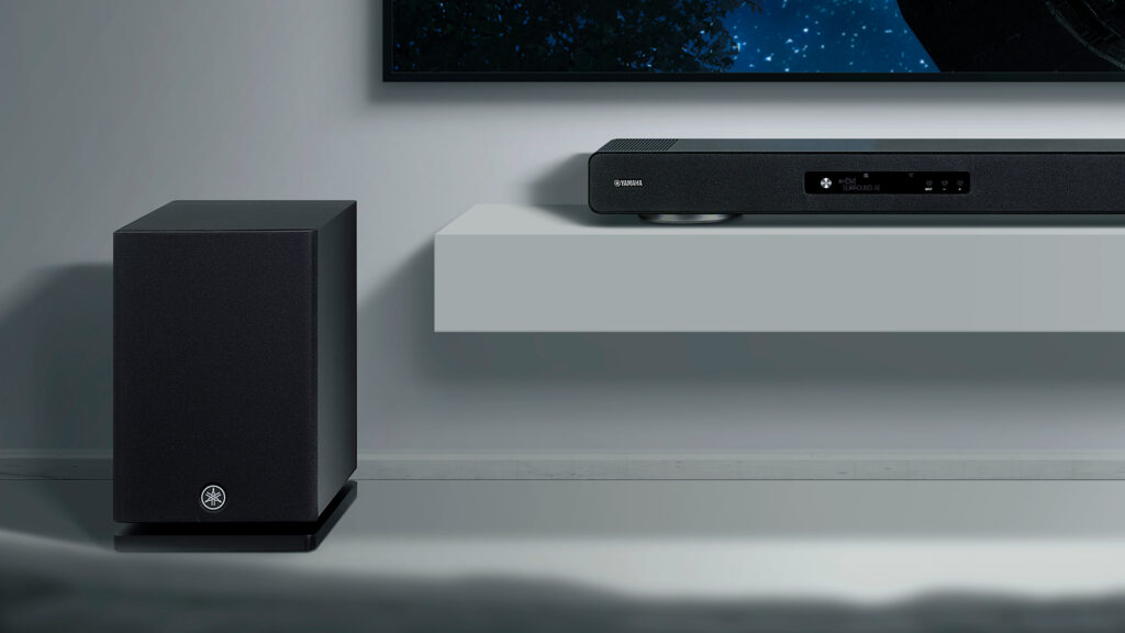 Yamaha True X Surround 90A soundbar with subwoofer in front of a TV