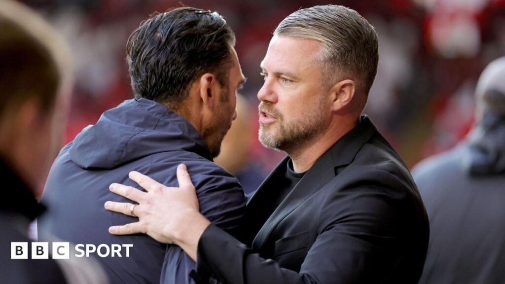 Aberdeen manager Jimmy Thelin and FCSB manager Elias Charalambous during the UEFA Europa League play-off match at Pittodrie Stadium, Aberdeen