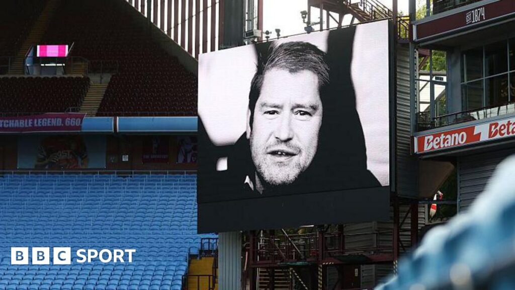 A black and white image of Matt Beard at Villa Park