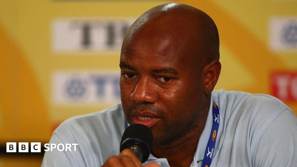 Mike Powell speaking at a news conference during the World Championships in 2007