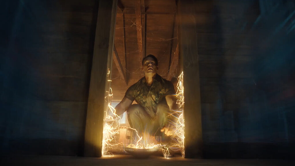 Peacemaker season 2 episode 4 changes what I thought I knew about the origins of the Quantum Unfolding Chamber Chris Smith squatting down and looking up as the Quantum Unfolding Chamber door is relocated in Peacemaker season 2 episode 4