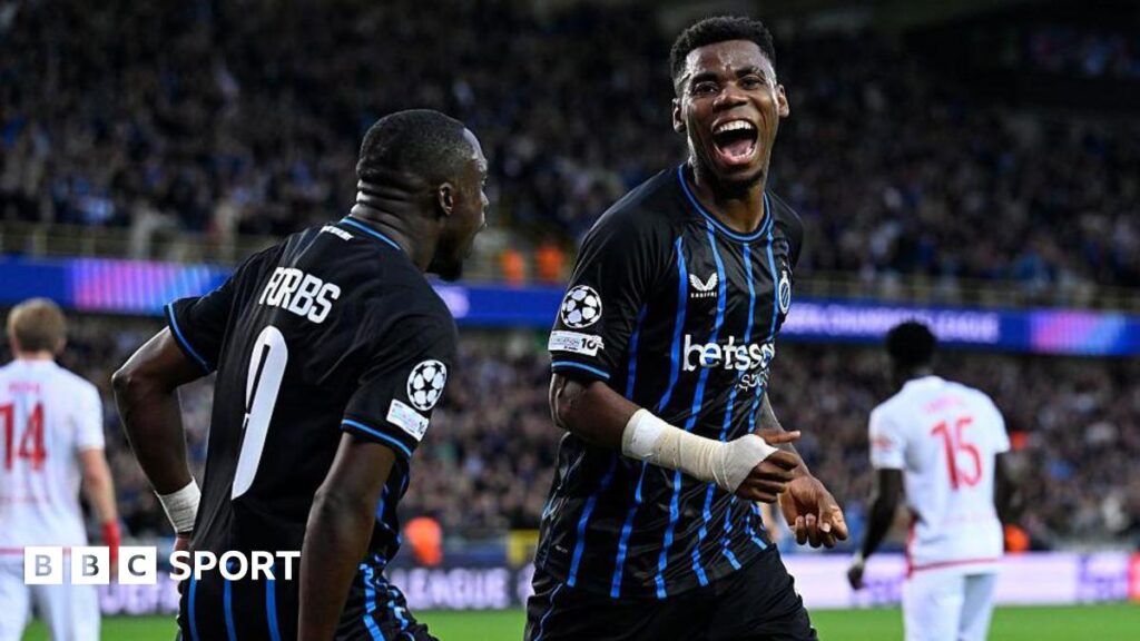 Raphael Onyedika of Club Brugge celebrates 2-0 with Carlos Forbs