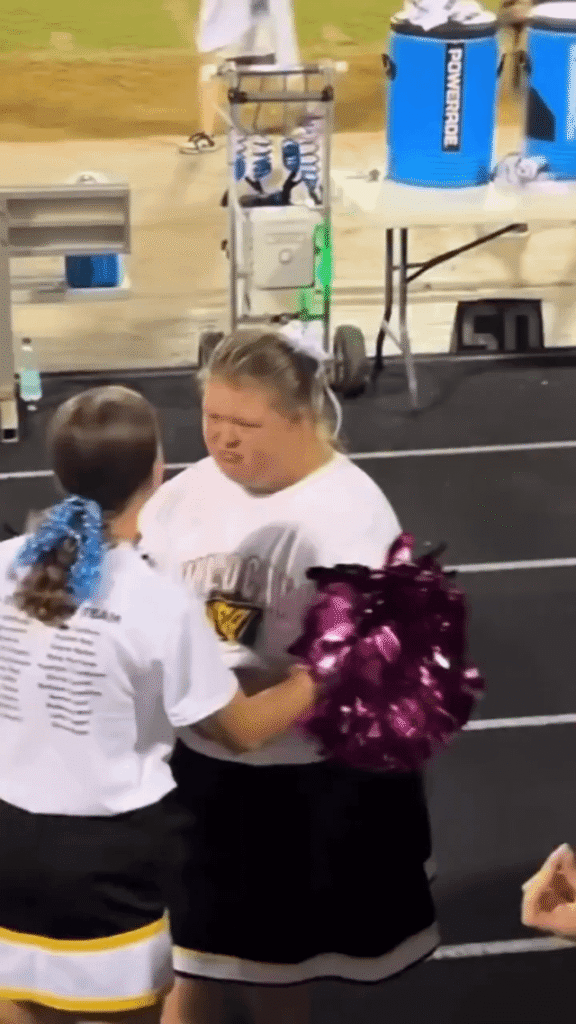 No one intended to go with this girl to the high school dance, but the team captain invited her to go with him