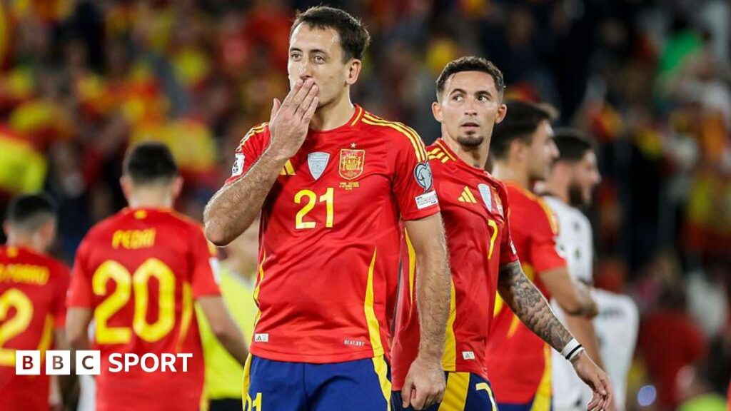 Mikel Oyarzabal blows a kiss to the fans as Spain celebrate