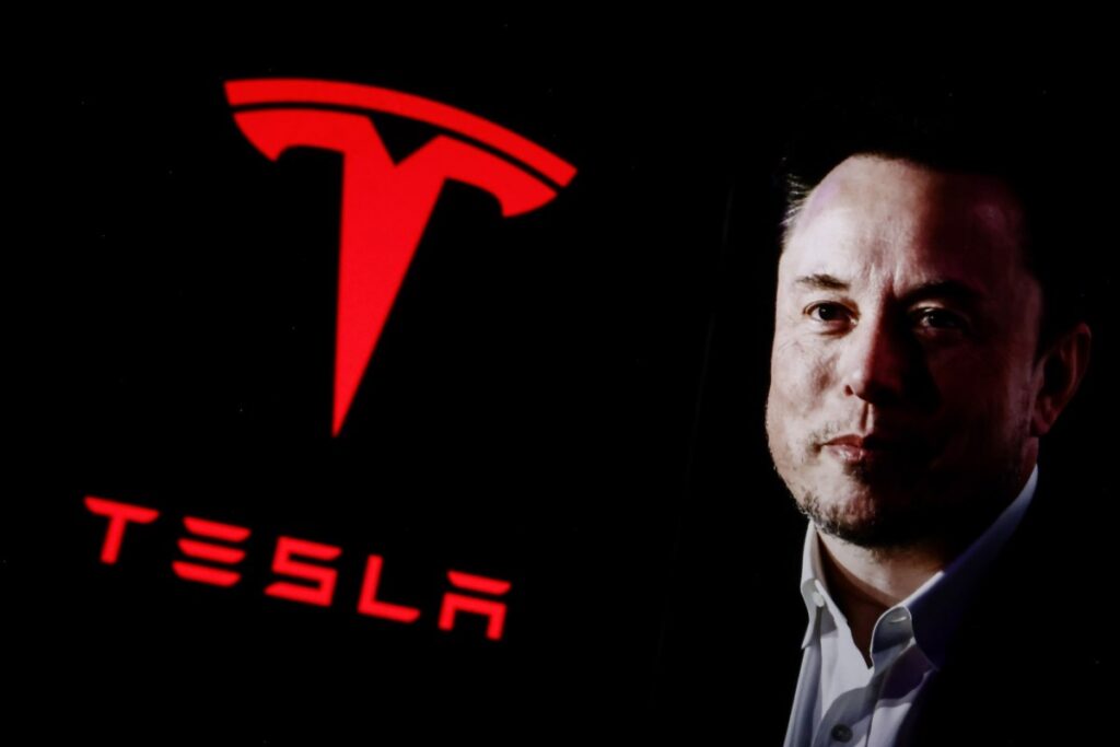 Norway’s wealth fund vote is latest blow to Musk’s $1 trillion pay package Elon Musk next to large red Tesla logo