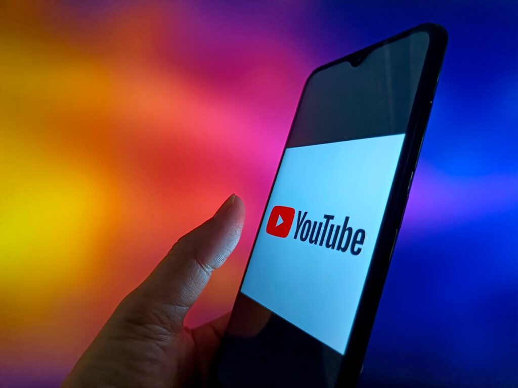 An illustration photo shows YouTube logo in a smartphone