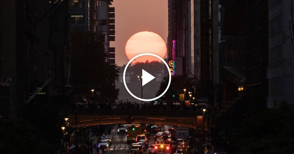 Crowds Flood New York City Streets for First Day of Manhattanhenge